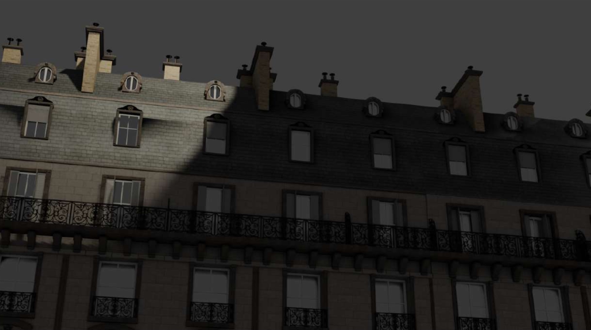 Haussmann-style Paris facade in raking light
